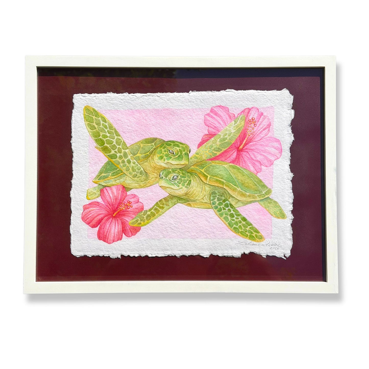framed artwork watercolor painting on handmade paper of a green sea turtles with pink flowers on a textured background by artist Liliane Avalos Kauai Hawaii