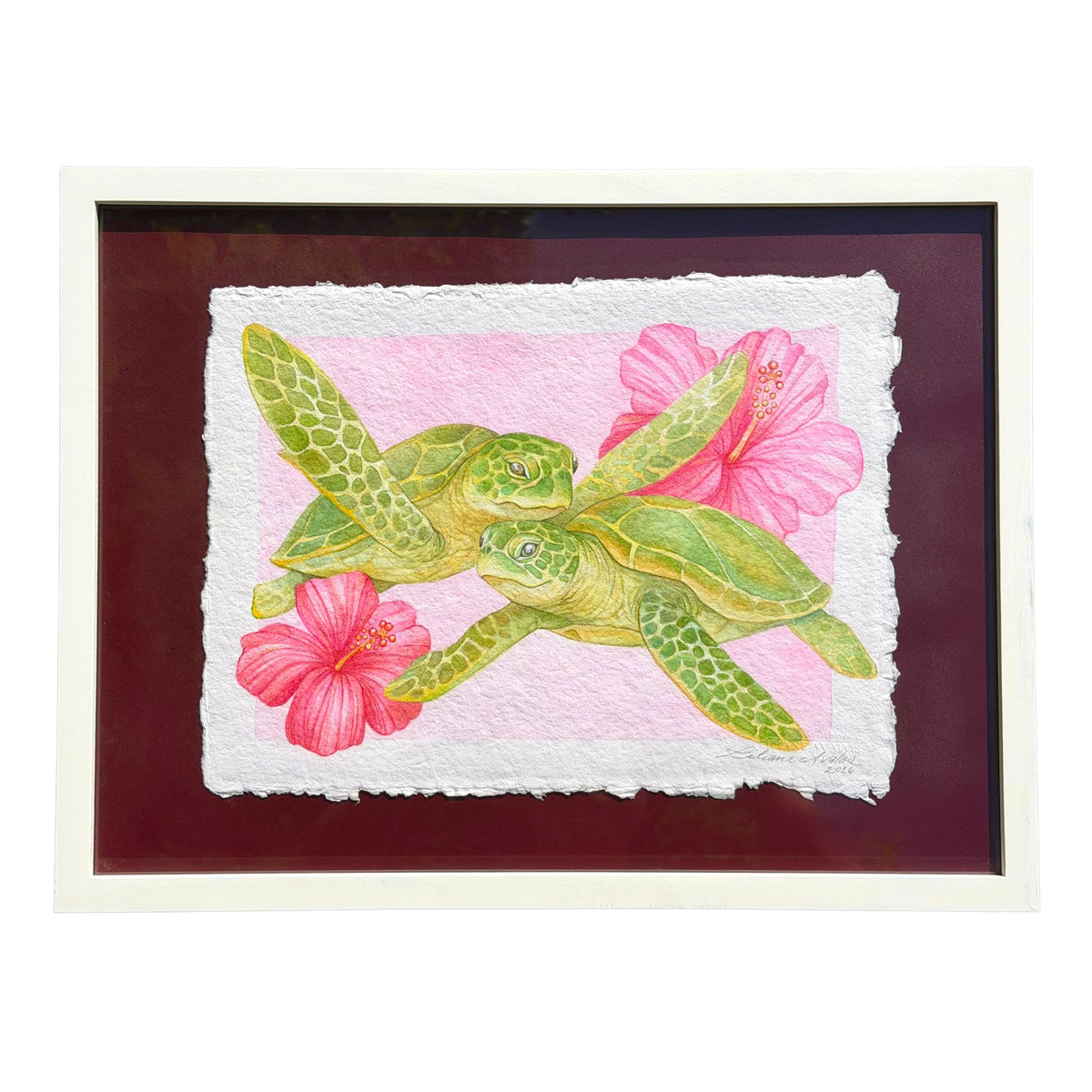 framed watercolor painting on handmade paper of a green sea turtles with pink flowers on a textured background by artist Liliane Avalos Kauai Hawaii