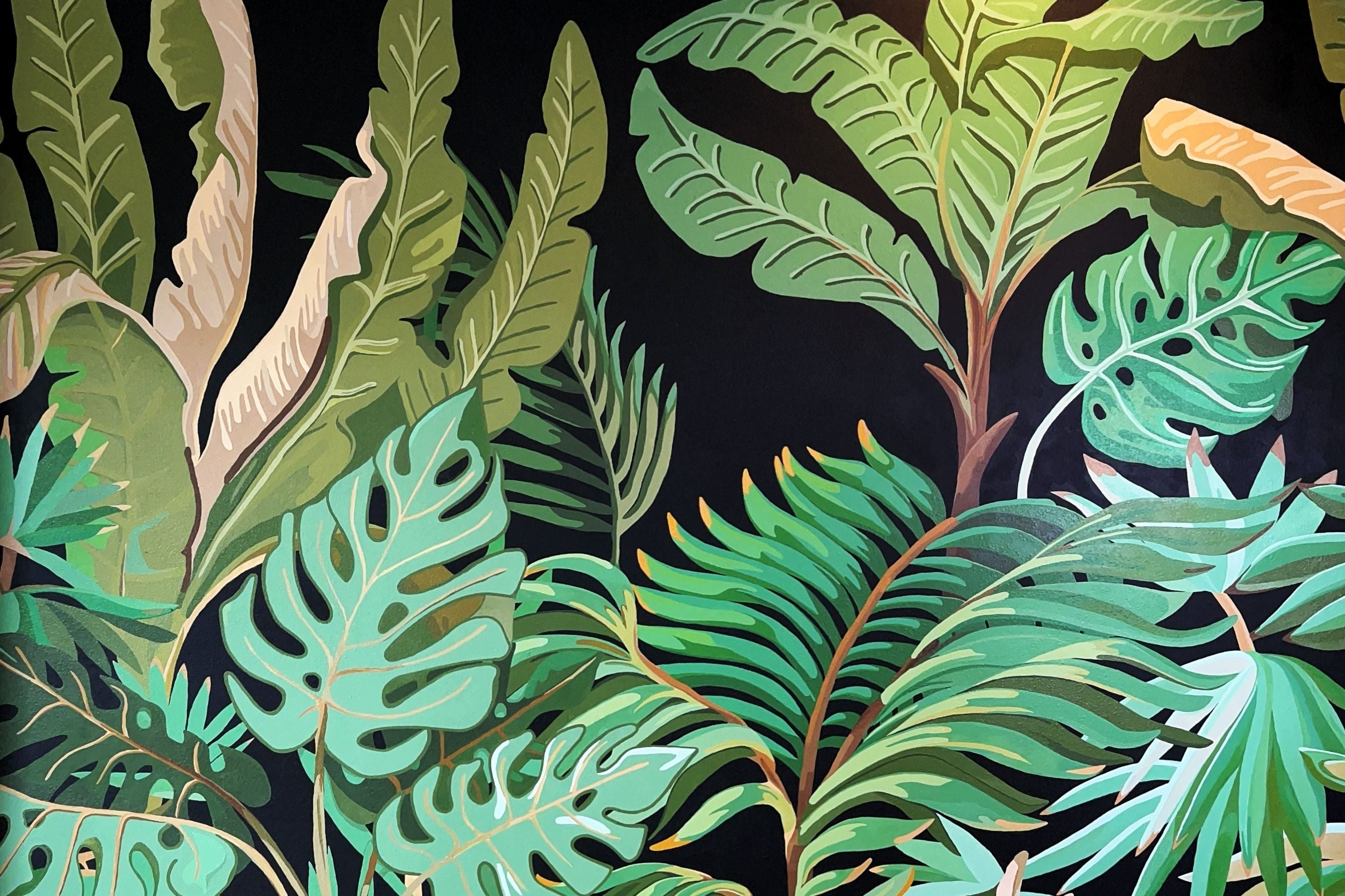 Tropical leaf pattern on a black background mural painted on Maui Hawaii. Mural Artwork by Liliane Avalos, Kauai Hawaii artist